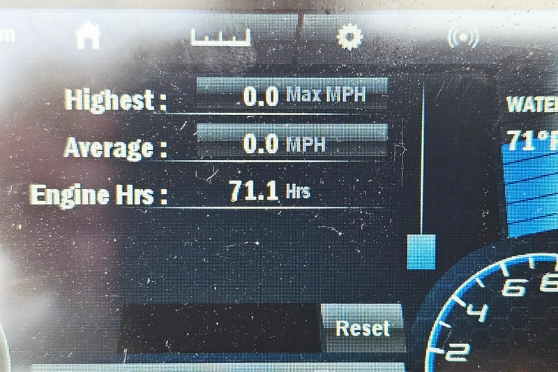 Slide: The Image of Dashboard display of a 2020 Yamaha Boats 195 FSH Sport showing engine hours and speed metrics. - 24