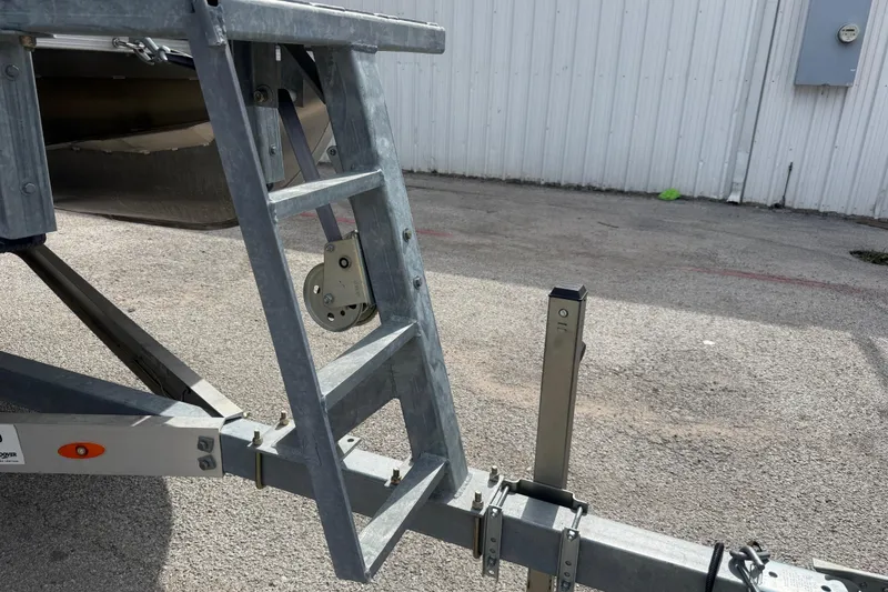 Slide: The Image of Metal ladder and trailer hitch on a 2023 Berkshire 20A CTS boat trailer. - 19
