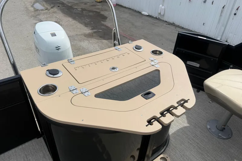 Slide: The Image of 2023 Berkshire 20A CTS boat deck with Suzuki motor and fishing station. - 27