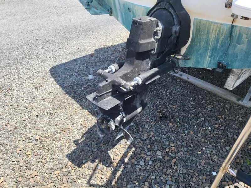 Slide: The Image of Bayliner 2252 Ciera Express 2000 outboard motor on gravel surface. - 11