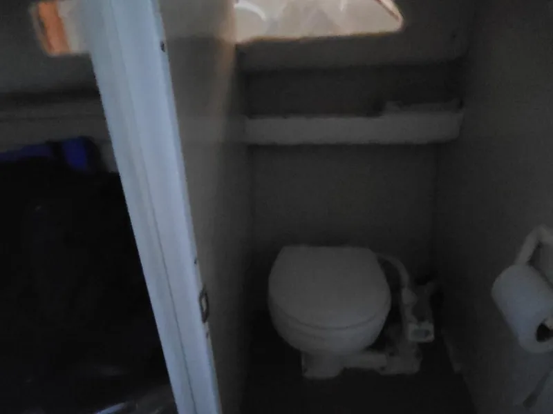 Slide: The Image of Interior of 2000 Bayliner 2252 Ciera Express with toilet. - 15