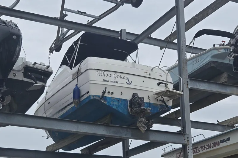 Slide: The Image of Bayliner 2252 Ciera Express 2000 boat stored on elevated rack in New Jersey marina. - 21