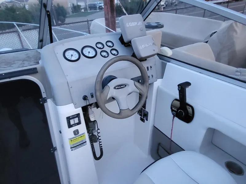 Slide: The Image of Interior view of Bayliner 2252 Ciera Express 2000 helm. - 5