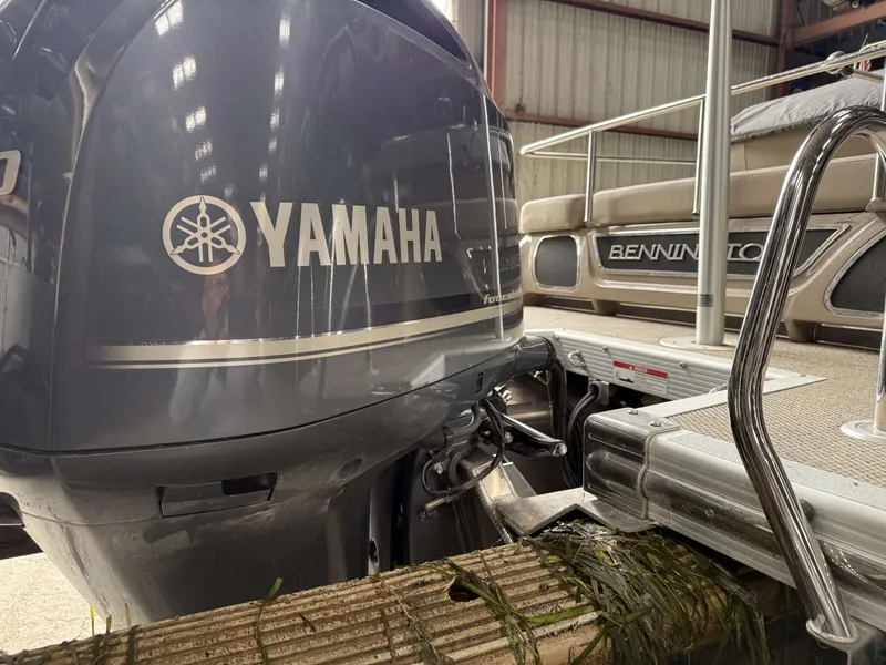 Slide: The Image of 2020 Bennington RSB with Yamaha outboard motor in warehouse. - 5