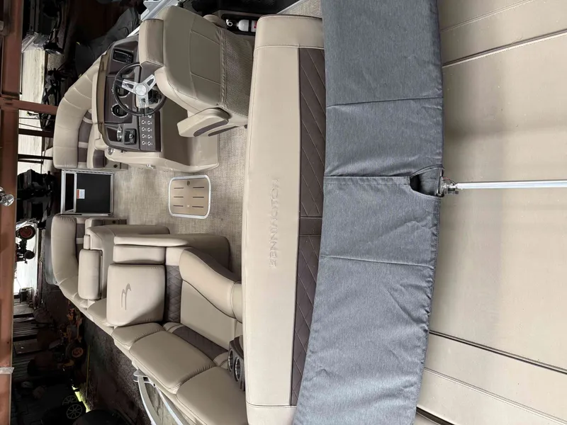 Slide: The Image of Interior view of a 2020 Bennington RSB pontoon boat with luxurious seating. - 8