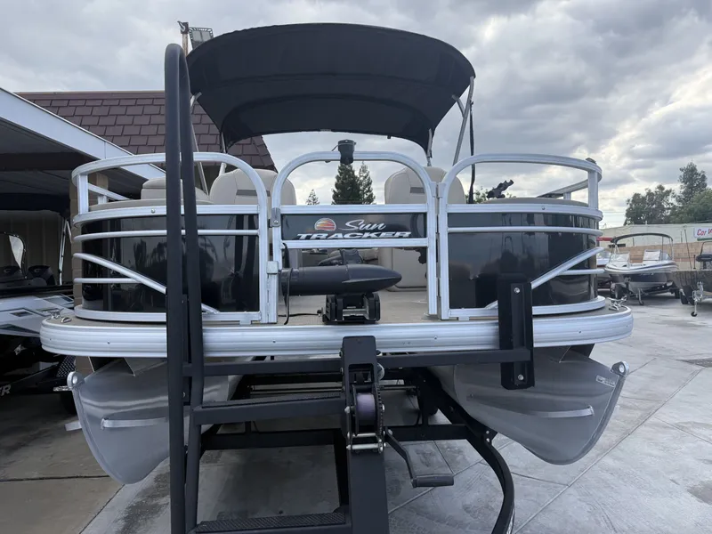 Slide: The Image of 2021 Sun Tracker FISHIN BARGE 20 DLX with 90HP Mercury on trailer. - 3