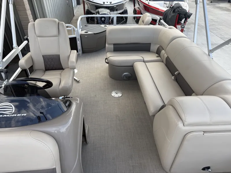 Slide: The Image of Interior of 2021 Sun Tracker FISHIN BARGE 20 DLX with comfortable seating. - 4