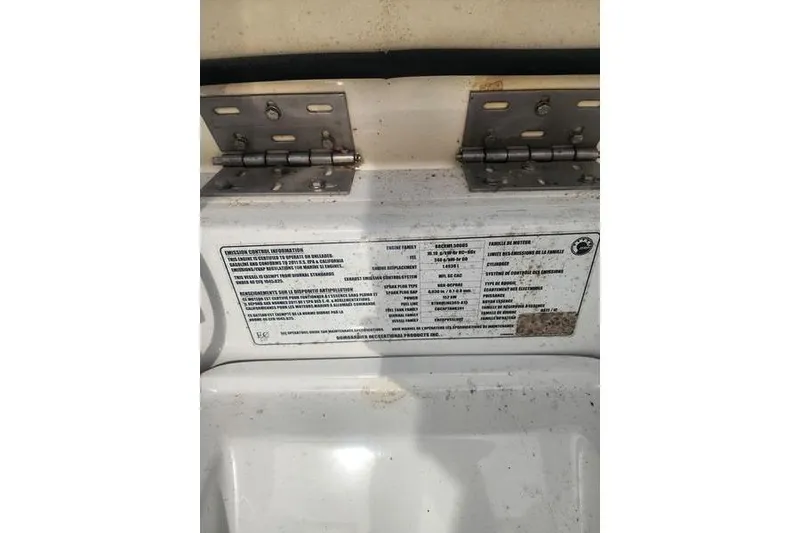 Slide: The Image of 2012 Sea-Doo Sport Boats 180 Challenger emission control information label. - 25