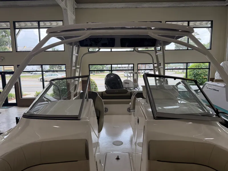 Slide: The Image of Interior view of a 2026 Key West 239 DFS boat in showroom. - 14