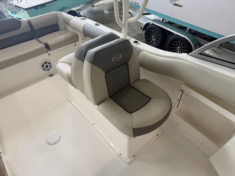 Slide: The Image of Interior of Key West 239 DFS boat, seating area, year 2026. - 2