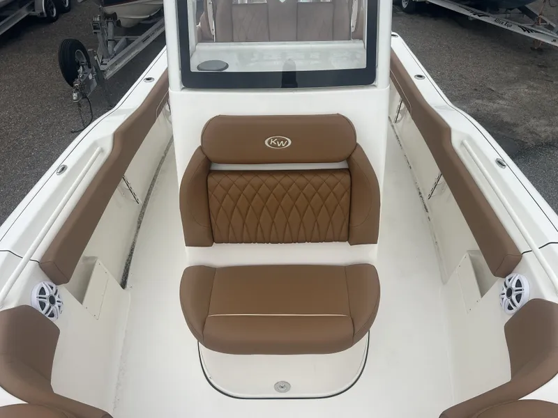 Slide: The Image of Interior of 2026 Key West 249 FS boat with brown seating. - 5