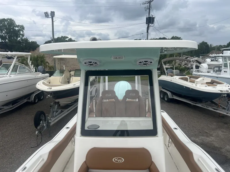 Slide: The Image of 2026 Key West 249 FS boat on a trailer outdoors. - 7