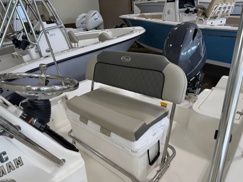 Slide: The Image of Key West 1720 Center Console 2026 with helm and seating area. - 10