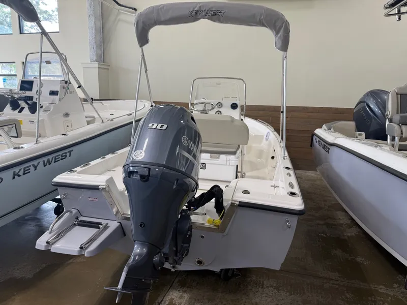 Slide: The Image of 2026 Key West 1720 Center Console boat in showroom. - 5