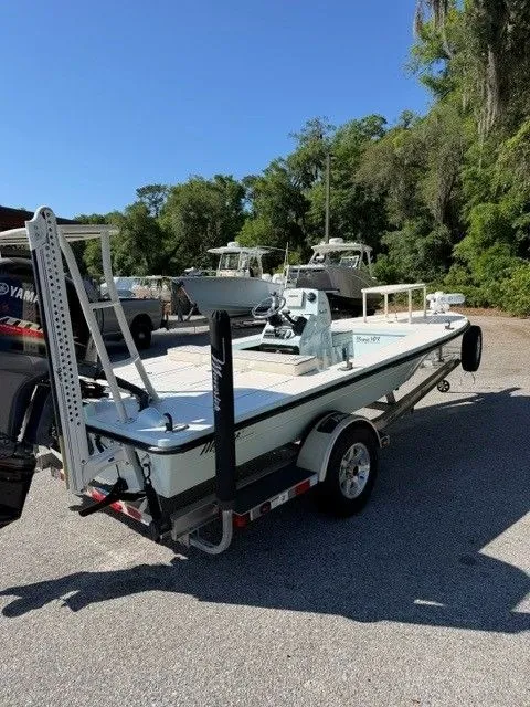 Slide: The Image of 2017 Maverick Mirage 18 HPX-V boat on trailer outdoors. - 10