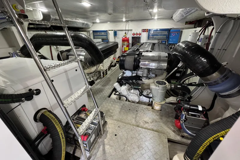 Slide: The Image of Engine room of 2024 Galeon 560 Fly yacht, featuring advanced machinery and equipment. - 70