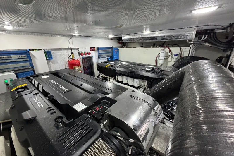 Slide: The Image of Engine room of 2024 Galeon 560 Fly yacht featuring Volvo Penta engines and modern equipment. - 74