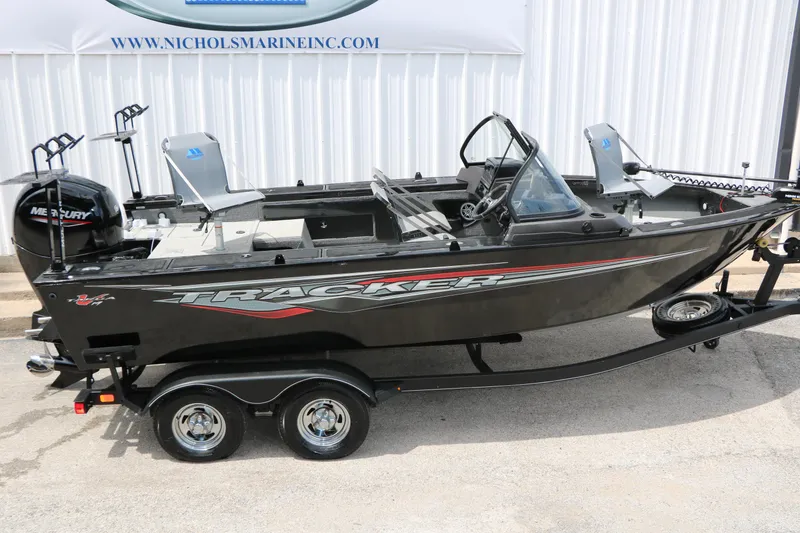 Slide: The Image of 2022 Tracker Targa V-19 Combo boat on trailer, featuring sleek design and Mercury engine. - 10
