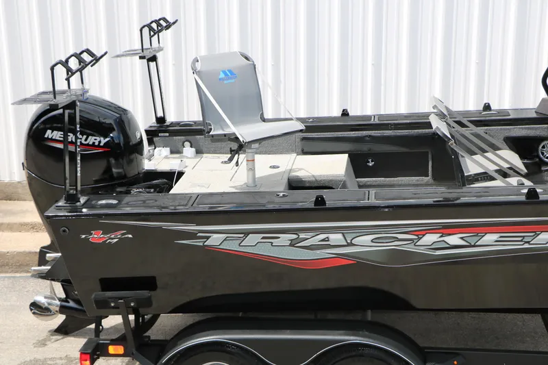 Slide: The Image of 2022 Tracker Targa V-19 Combo boat with Mercury engine, side view. - 11