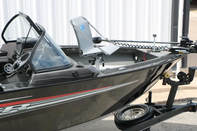 Slide: The Image of 2022 Tracker Targa V-19 Combo boat with Minn Kota trolling motor on trailer. - 12