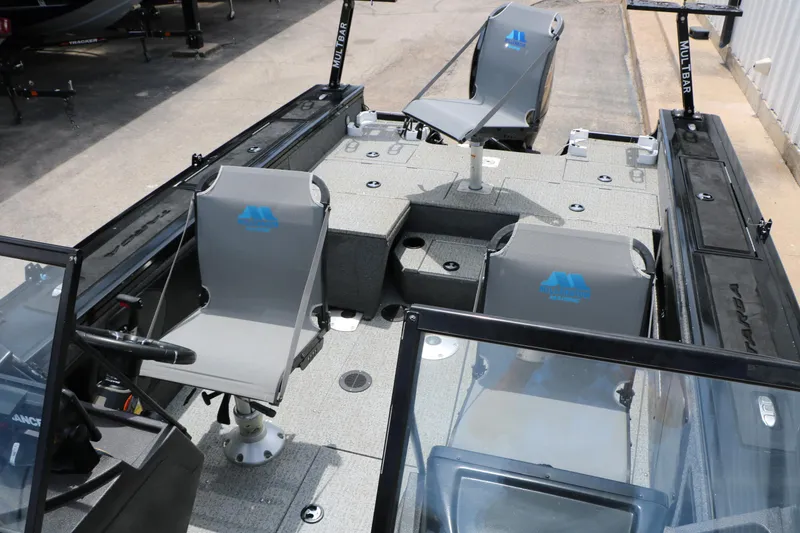 Slide: The Image of 2022 Tracker Targa V-19 Combo boat interior with seating and fishing deck. - 20