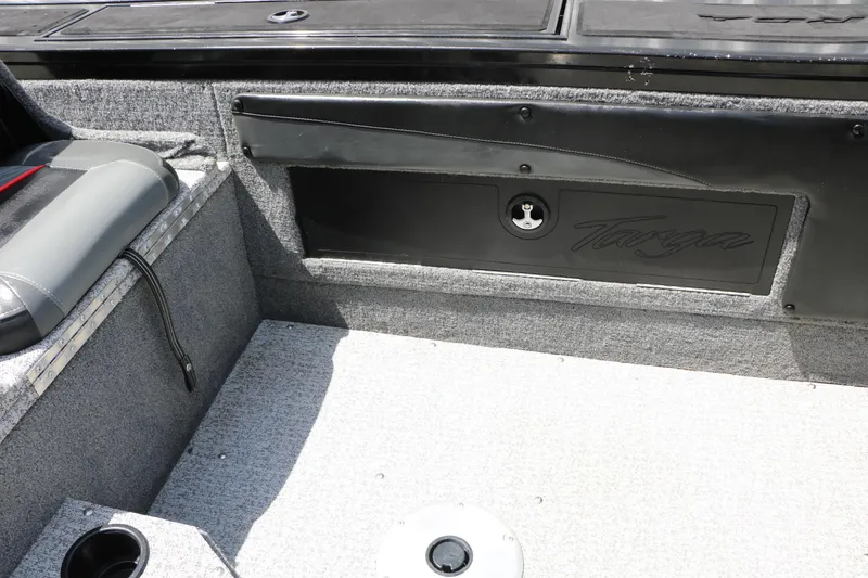Slide: The Image of 2022 Tracker Targa V-19 Combo boat interior with storage compartment and seating. - 30