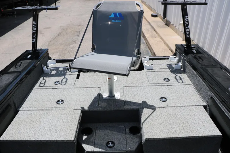 Slide: The Image of 2022 Tracker Targa V-19 Combo boat interior with fishing seat and storage compartments. - 35