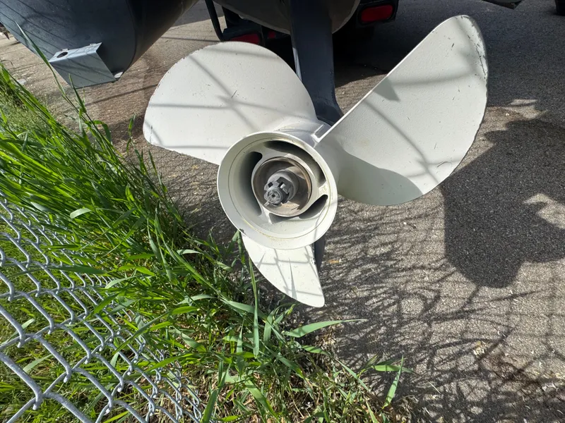 Slide: The Image of Propeller of a 2014 Bennington 20SLM boat on asphalt. - 6