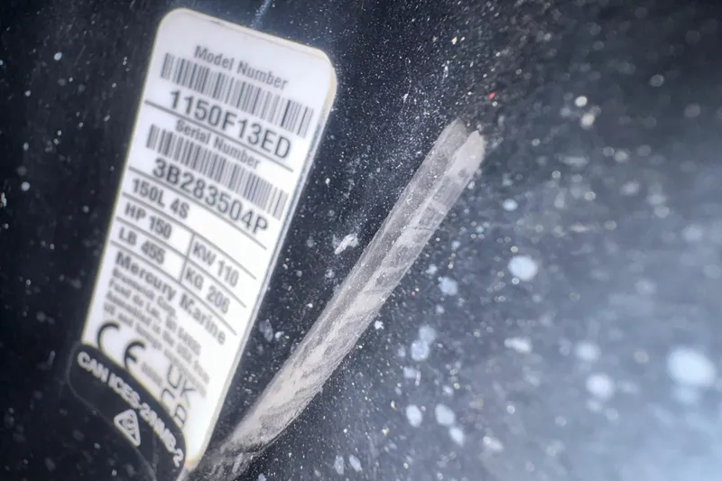Slide: The Image of Label on a 1992 Bayliner 2052 Trophy Walkaround boat, displaying model and serial numbers. - 11