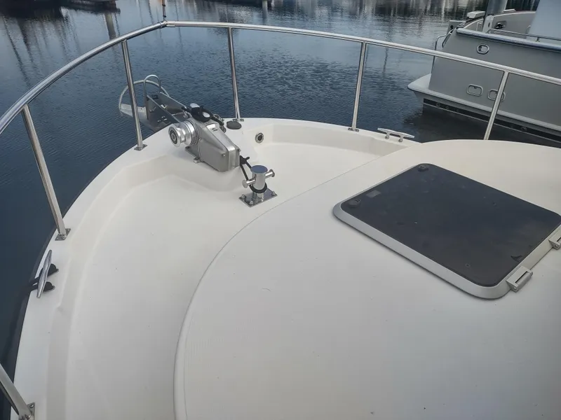 Slide: The Image of Deck of a 2005 Nordic Tug 32 boat in harbor. - 14