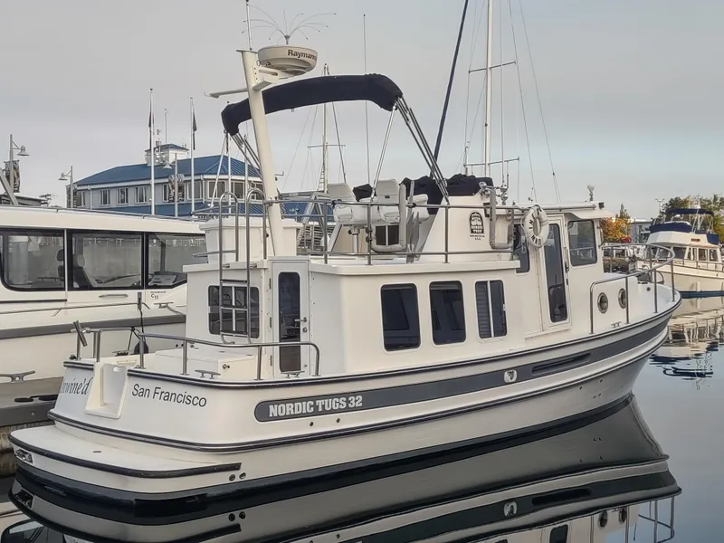 Slide: The Image of 2005 Nordic Tug 32 docked in San Francisco harbor. - 2