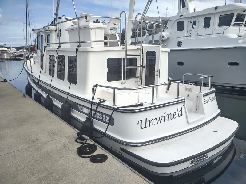 Slide: The Image of 2005 Nordic Tug 32 docked, side view. - 21