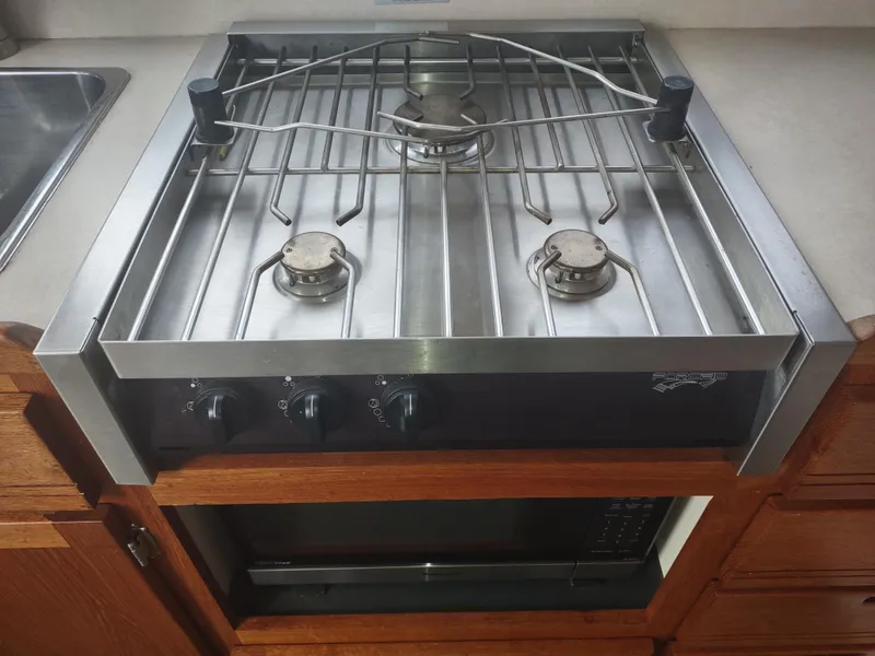 Slide: The Image of Gas stove in a 2005 Nordic Tug 32 yacht kitchen. - 35