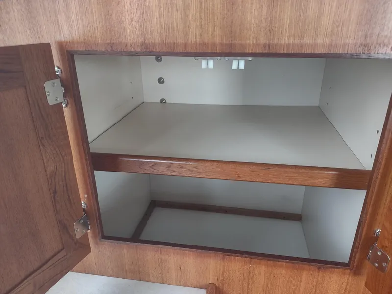 Slide: The Image of Wooden cabinet interior of a 2005 Nordic Tug 32. - 39