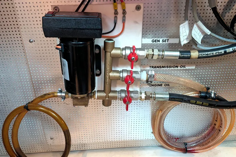 Slide: The Image of Engine room oil management system in a 2006 North Pacific 42 Pilothouse boat. - 34