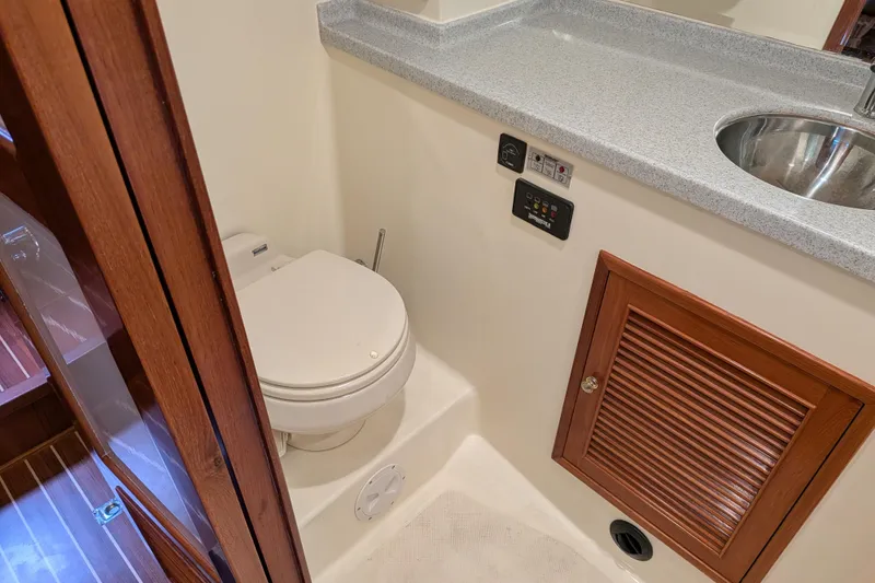 Slide: The Image of Bathroom interior of 2006 North Pacific 42 Pilothouse with toilet and sink. - 44