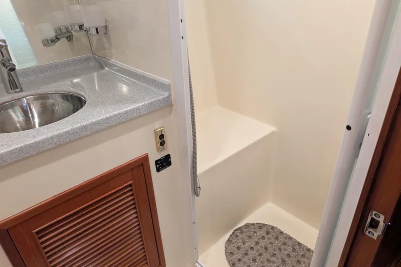 Slide: The Image of Bathroom interior of 2006 North Pacific 42 Pilothouse with sink and shower area. - 46