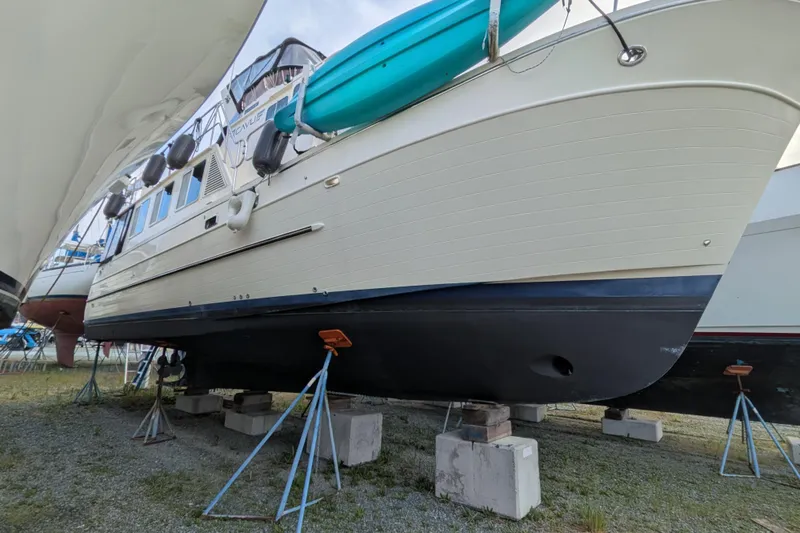 Slide: The Image of 2006 North Pacific 42 Pilothouse yacht on stands, with a kayak on deck. - 55