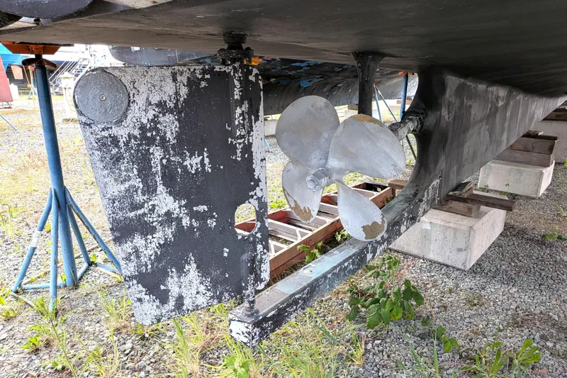 Slide: The Image of Underwater view of 2006 North Pacific 42 Pilothouse propeller and rudder on dry dock. - 57