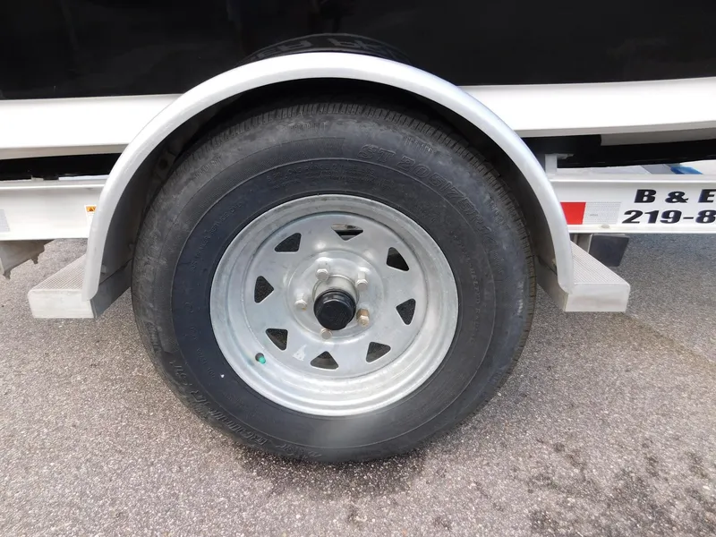 Slide: The Image of Tire of a 2022 Sea Pro 172 Bay boat trailer. - 14