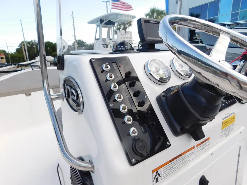 Slide: The Image of 2022 Sea Pro 172 Bay boat console with steering wheel and gauges. - 15