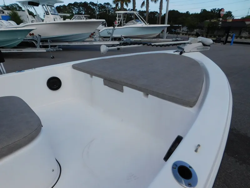 Slide: The Image of 2022 Sea Pro 172 Bay boat with gray cushions at the dock. - 7