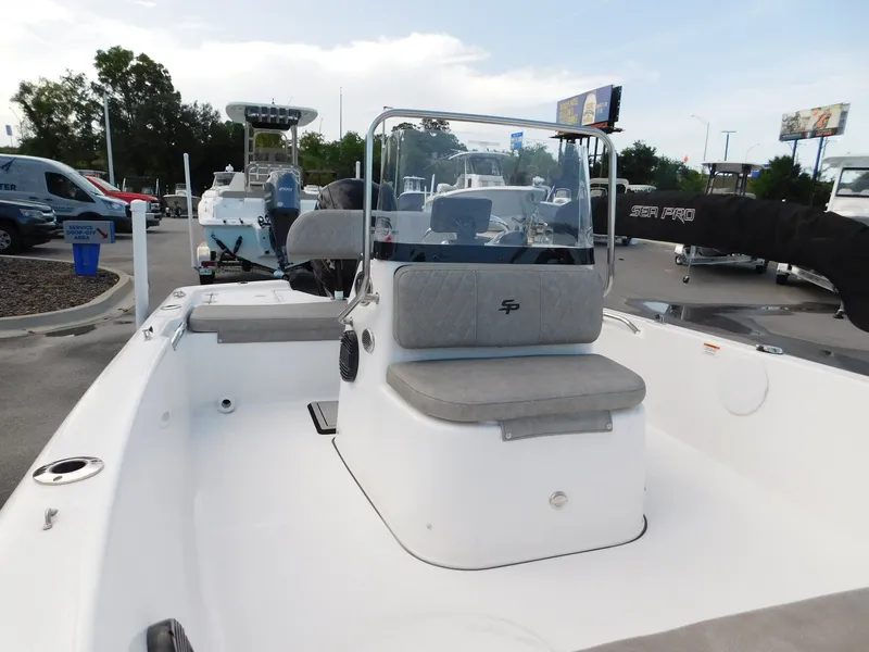 Slide: The Image of 2022 Sea Pro 172 Bay boat with gray seating outdoors. - 9