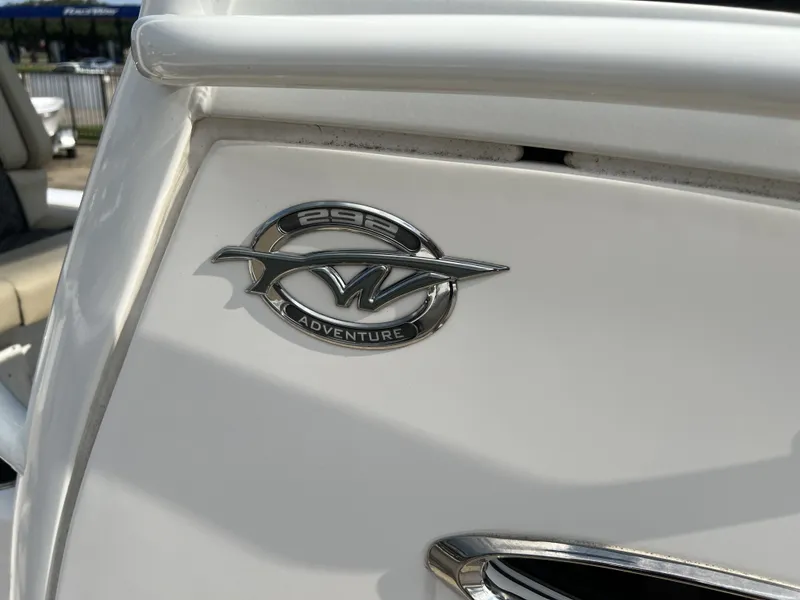 Slide: The Image of Close-up of Tidewater 292 CC Adventure 2021 boat emblem. - 14