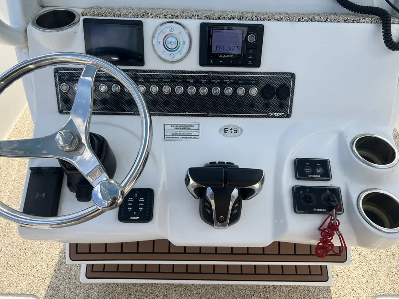 Slide: The Image of 2021 Tidewater 292 CC Adventure boat helm console. - 36