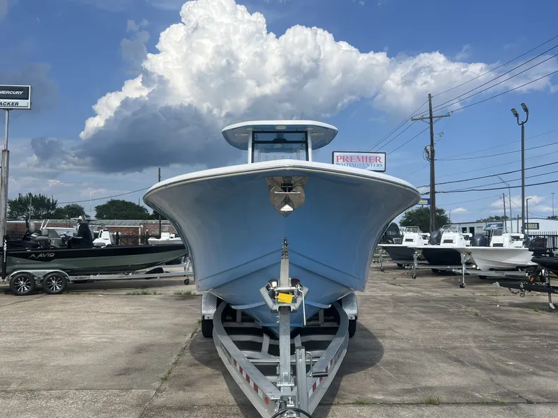 Slide: The Image of Tidewater 292 CC Adventure 2021 on trailer, blue sky, clouds. - 6