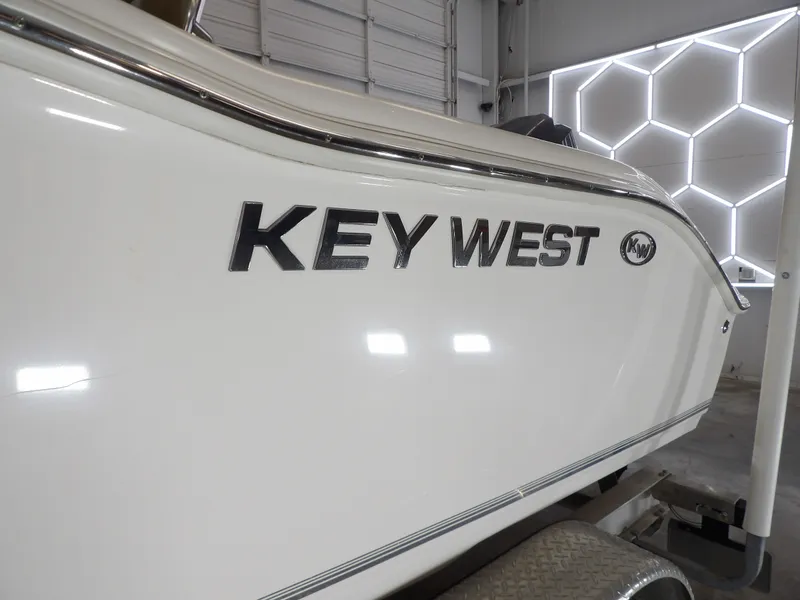 Slide: The Image of Key West 219 FS boat, 2016 model, in a garage. - 14