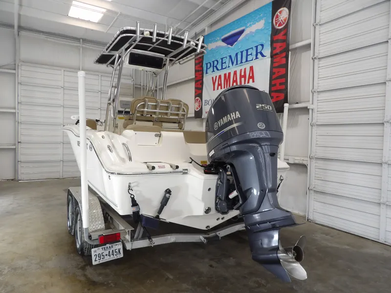 Slide: The Image of 2016 Key West 219 FS boat with Yamaha engine in warehouse. - 16