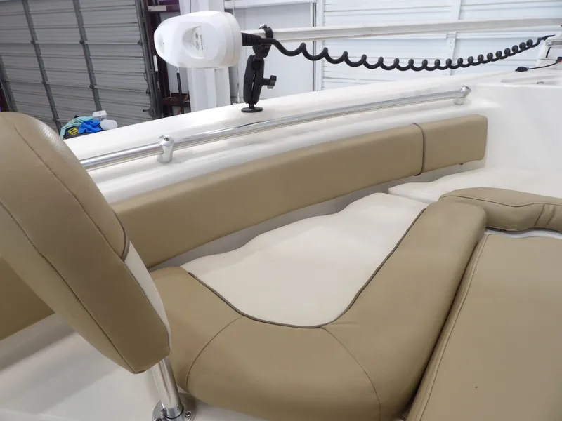 Slide: The Image of Interior of a 2016 Key West 219 FS boat with beige upholstery. - 19