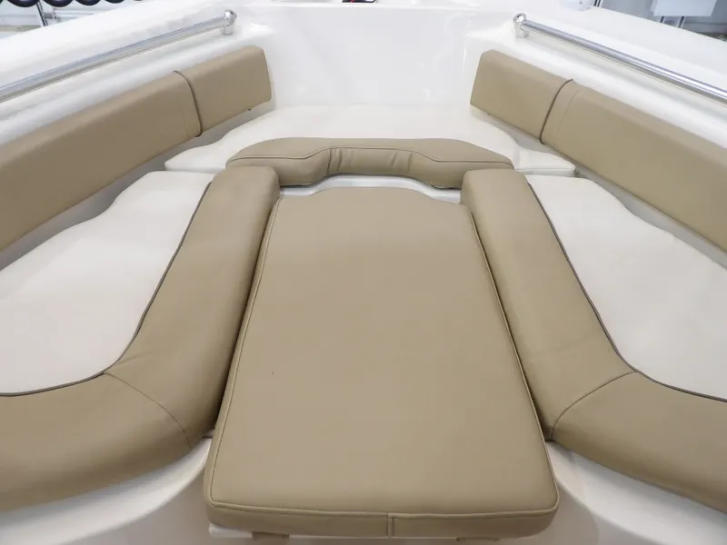 Slide: The Image of Interior view of a 2016 Key West 219 FS boat with cushions. - 21